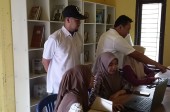 Realisasi Pembuatan Perpustakaan Mini Dan Ruang Belajar Komputer Desa Lubuk Besar Mendukung Pendidikan IT