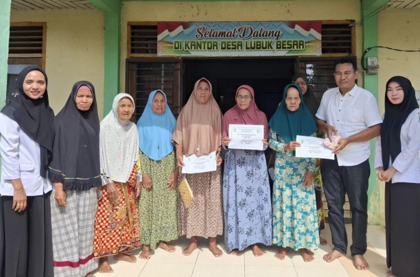 Penyaluran BLT Dana Desa Triwulan I Tahun 2025 di Desa Lubuk Besar Berlangsung di Bulan Ramadan.